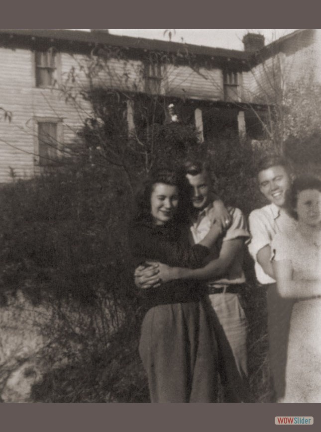 cousins in fron of new John Baker home